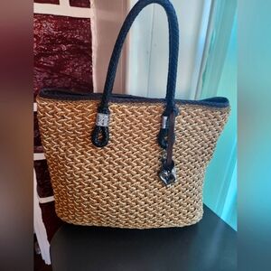 Elegant "Brighton"Tan Woven Handbag with leather woven handles.